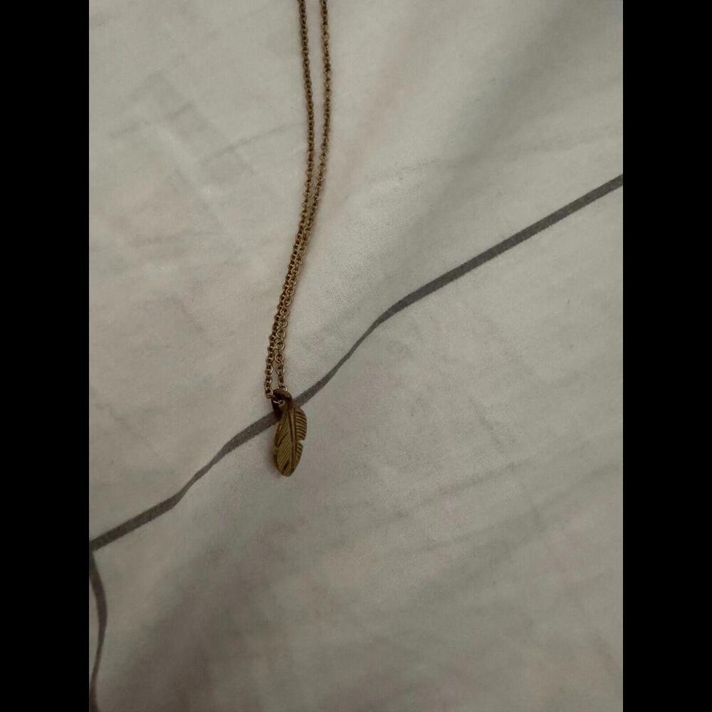 Gold feather necklace
